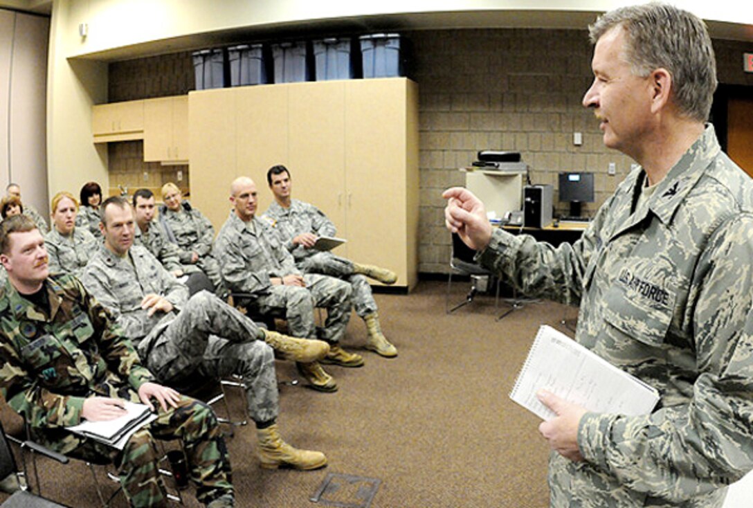 Col. Ron Solberg, the 119th Support Group Commander, (right) addresses full-time North Dakota Air National Guard personnel Mar. 15, 2010, as he initiates personnel mobilization plans for the regional flood fight beginning in the Red River Valley, Fargo, N.D.  The North Dakota National Guard plan calls for 300-400 personnel to be voluntarily placed on state active duty orders within 24-hours.  The plans provide for all of the same flood fighting missions that the N.D. National Guard provided in the historic flood fight in the spring of 2009.   (DoD photo by Senior Master Sgt. David H. Lipp)