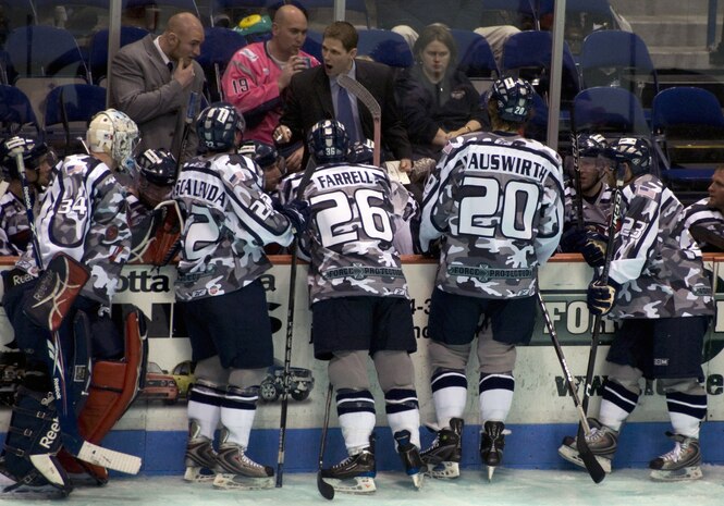 Members of the South Carolina Stingrays take direction from head coach Cail MacLean in the third period of a hockey game against the Florida Everblades March 12 at the North Charleston Coliseum. The Everblades trailed the Stingrays 0-3 in the  third period until a single goal prevented a shutout, ending the game in a 1-3 win for the Stingrays. (U.S. Air Force photo/Staff Sgt. Daniel Bowles)