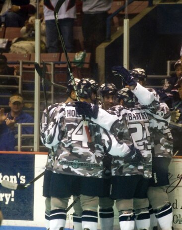 Members of the South Carolina Stingrays hockey team cheers after scoring a goal against the Florida Everblades March 12. The South Carolina Stingrays captured a spot in the 2010 Kelly Cup Playoffs on March 12 with their 1-3 win against Florida. (U.S. Air Force photo/Staff Sgt. Daniel Bowles)