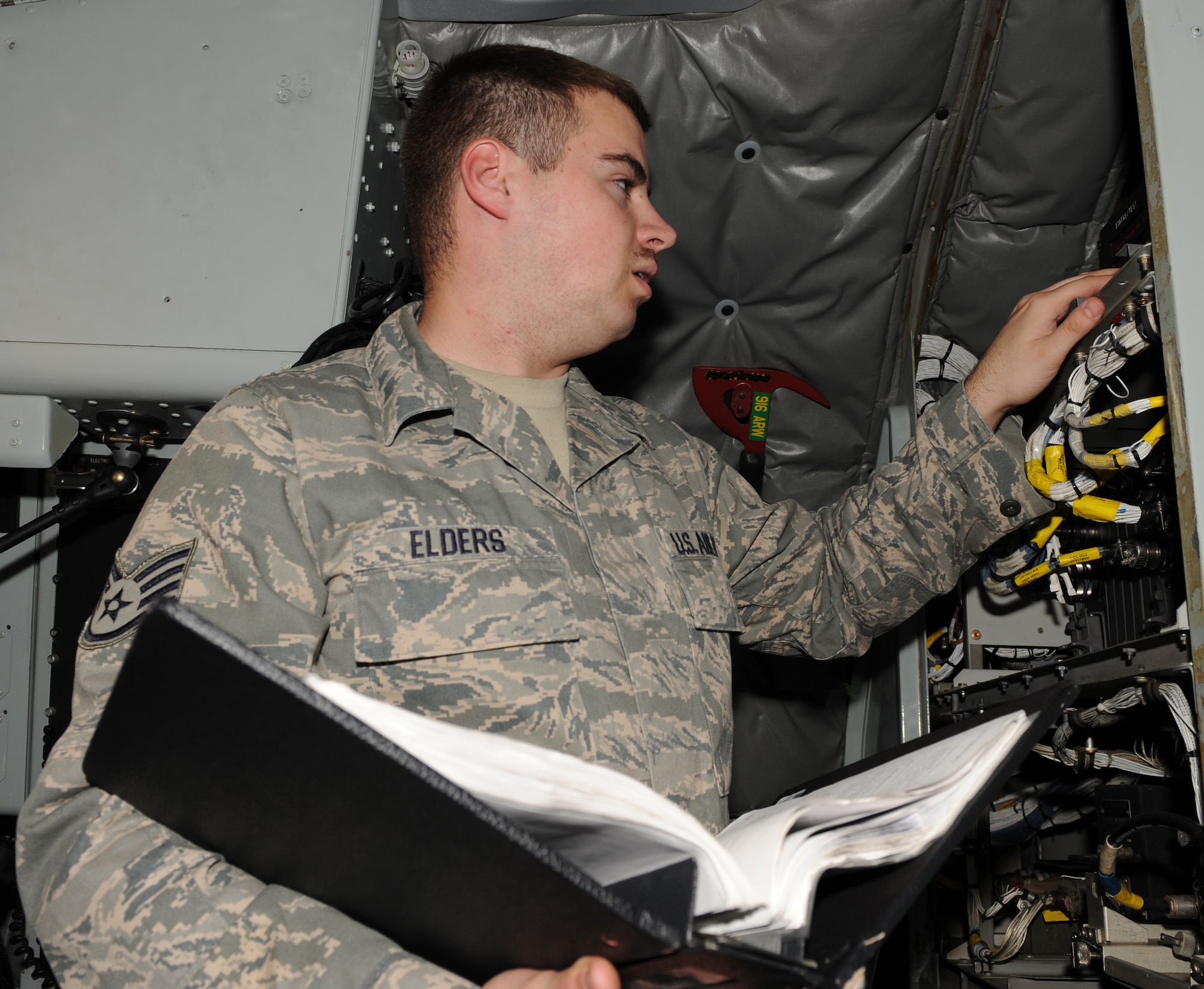 Staff Sgt. Dwayne Elders, 911th Air Refueling Squadron avionics craftsman, checks a KC-135R Stratotanker's inertial navigation system during a flight control system test on Seymour Johnson Air Force Base, N.C., March 15, 2010. Flightline avionics Airmen perform this test to ensure an on-time takeoff. Elders hails from Dearborn, Mich.   (U.S. Air Force photo/Airman 1st Class Gino Reyes)