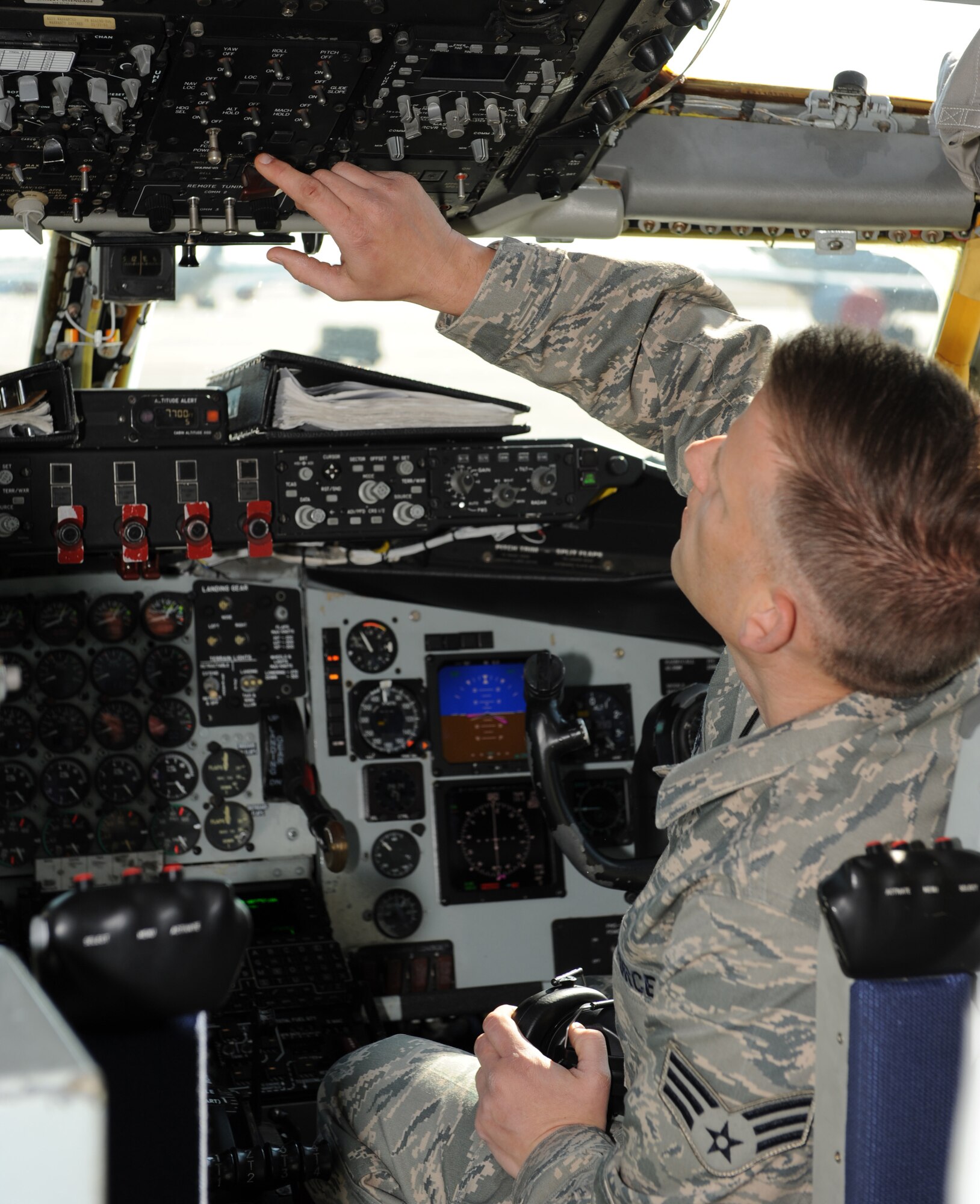 Senior Airman Christopher Fuller, 916th Air Refueling Wing avionics apprentice, inspects a KC-135R Stratotanker autopilot switch during a flight control system test on Seymour Johnson Air Force Base, N.C., March 15, 2010. Fuller is a reservist on training orders for a year to earn his 5-level qualification. Fuller hails from Holly Springs, N.C. (U.S. Air Force photo/Airman 1st Class Gino Reyes)