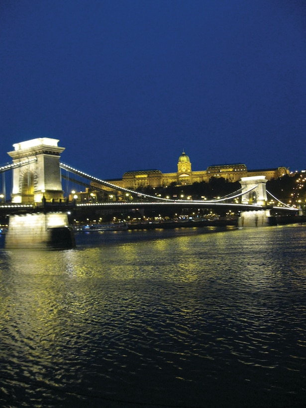 Light reflects off the Chain Bridge onto the Danube River in Budapest, Hungary Oct. 12, 2009. The bridge connects the once divided cities of Buda and Pest. (U.S. Air Force photo/2nd Lt. Brian Wagner)