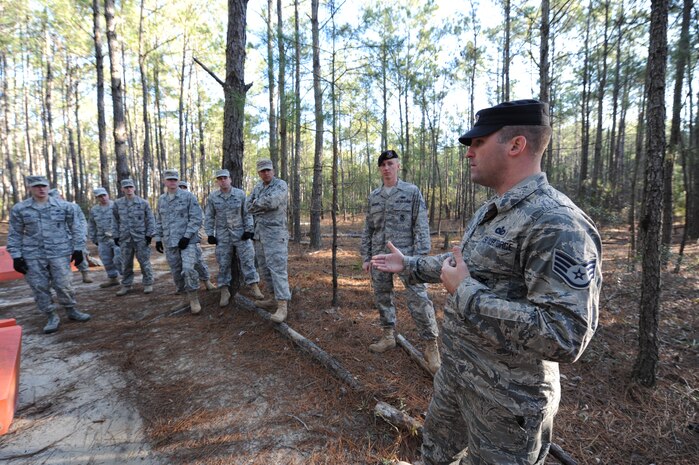 Staff Sgt. Justine Coats teaches entry control point operations for deployed locations as well as vehicle and personnel searches at Joint Base Charleston March 16, 2010. Security forces personnel received the training to prepare the members for future deployments. Sergeant Coats is a security forces combat readiness training instructor with the 628th Security Forces Squadron. (U.S. Air Force photo by James M. Bowman/released)