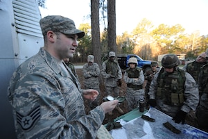 Staff Sgt. William Lloyd teaches land navigation and map reading for annual training at Joint Base Charleston March 16, 2009. Prime Base Engineer Emergency Forces, or Prime BEEF, receive contingency training at home station to prepare them for deployed locations. Sergeant Lloyd is a Simplified Acquisition Base Engineering Requirements, or SABER, technician with the 628th Civil Engineer Squadron. (U.S. Air Force photo by James M. Bowman/released)