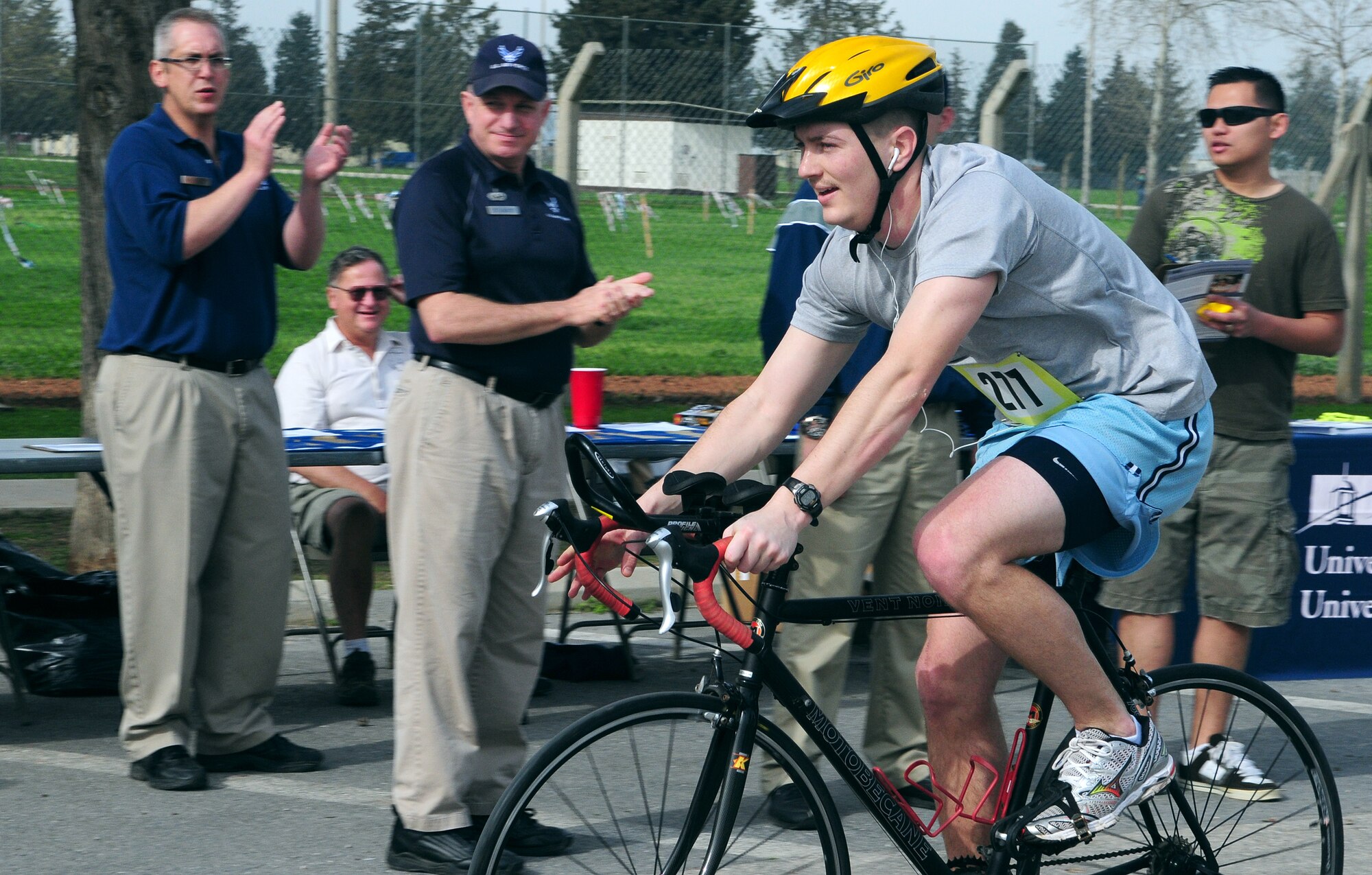 With a time of 49:13, Capt. Brian Robertson, 39th Contracting Squadron, crosses the finish line of the Strain your Brain Duathlon Saturday, March 13 at Incirlik Air Base, Turkey. The race, a modified duathlon, consisted of a 5K run and 12K bike, and more than 30 people participated in the fitness event. Prizes such as base exchange gift certificates and base theater passes were given to the top three men (under 30 and over 30) and women. At a time of 38:54, Staff Sgt. Brad Williams, 39th Maintenance Squadron, earned the best time for the men and Kim Ventura, wife of Anthony Ventura, Incirlik Army & Air Force Exchange Service manager, earned the best time for the women at 51:18. (U.S. Air Force photo/Senior Airman Alex Martinez)