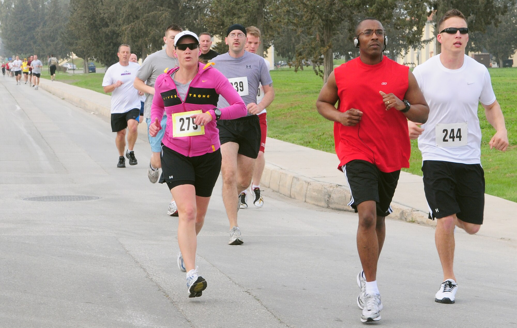 Participants of the Strain your Brain Duathlon pace themselves during the running portion of the race Saturday, March 13 at Incirlik Air Base, Turkey. The race, a modified duathlon, consisted of a 5K run and 12K bike, and more than 30 people participated in the fitness event. Prizes such as base exchange gift certificates and base theater passes were given to the top three men (under 30 and over 30) and women. At a time of 38:54, Staff Sgt. Brad Williams, 39th Maintenance Squadron, earned the best time for the men and Kim Ventura, wife of Anthony Ventura, Incirlik Army & Air Force Exchange Service manager, earned the best time for the women at 51:18. (U.S. Air Force photo/Senior Airman Alex Martinez)
