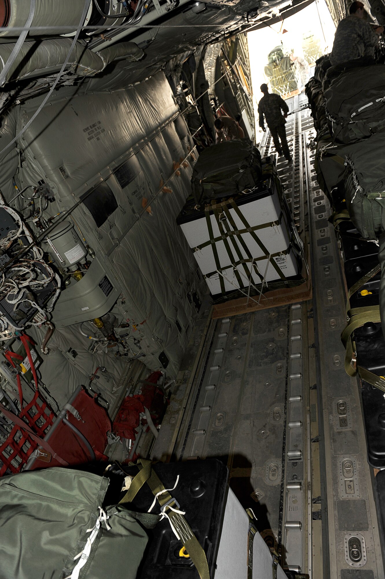An U.S. Air Force C-130J is loaded for an airdrop mission at Bagram Airfield, Afghanistan, March 2, 2010. (U.S. Air Force photo by/ Tech. Sgt. Jeromy K. Cross/released)




