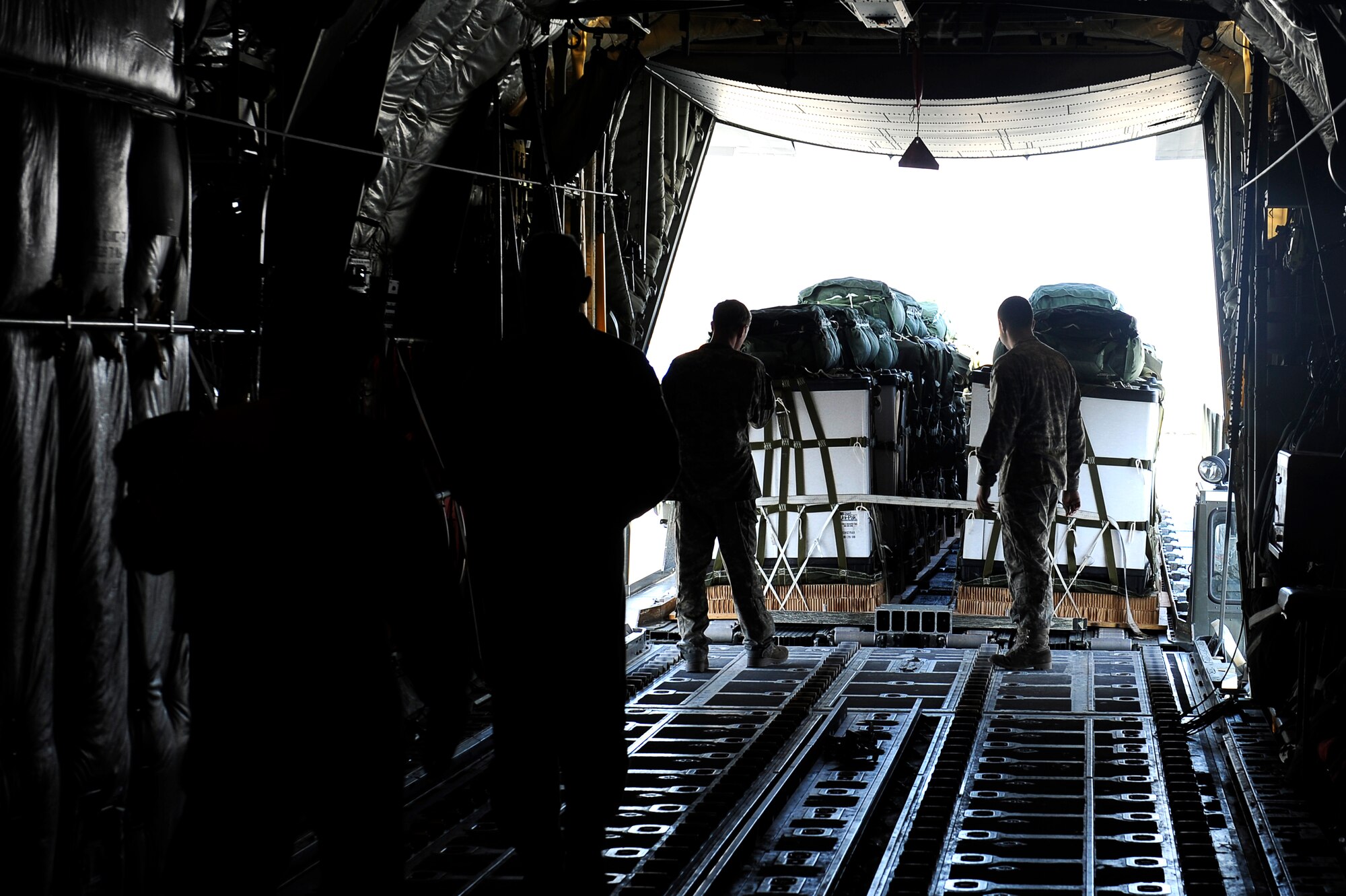 An U.S. Air Force C-130J is loaded for an airdrop mission at Bagram Airfield, Afghanistan, March 2, 2010. (U.S. Air Force photo by/ Tech. Sgt. Jeromy K. Cross/released)




