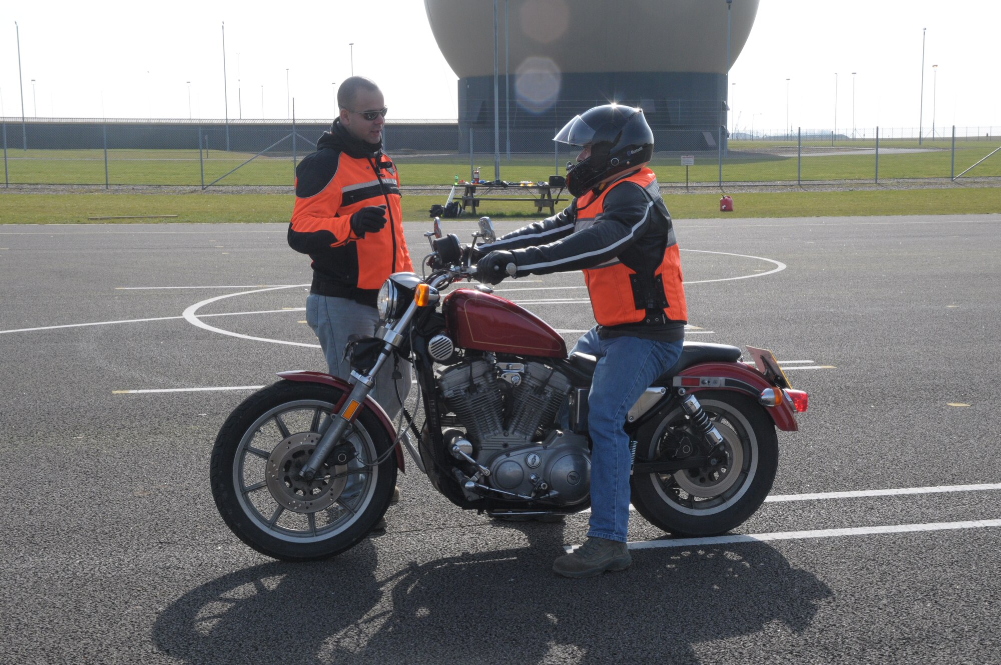 Staff Sgt. Alberto Emmons, 100th Maintenance Operations Squadron lead weapons controller, instructs one of the riders during the Beginner’s Motorcycle Safety Course at RAF Feltwell, England, March 5, 2010.  There are currently 17 trained rider coaches to lead the courses.  (U.S. Air Force photo by Staff Sgt. Connor Estes)