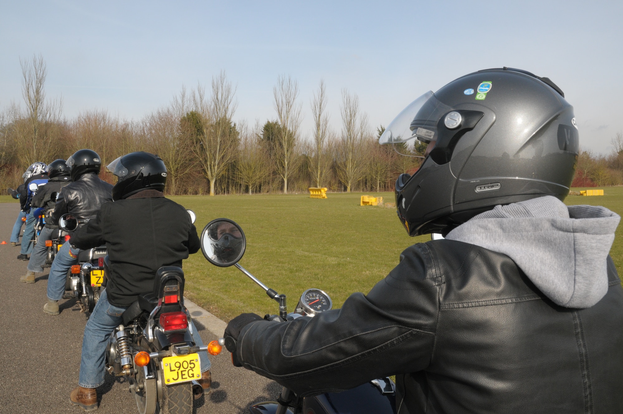 Motorcycle riders wait their turn during the Beginner’s Motorcycle Safety Course at RAF Feltwell, England, March 5, 2010.  The Air Force places high emphasis on the safety of personnel who operate motorcycles.  Awareness of risks, education and a safe attitude are keys to accident prevention.  (U.S. Air Force photo by Staff Sgt. Connor Estes)