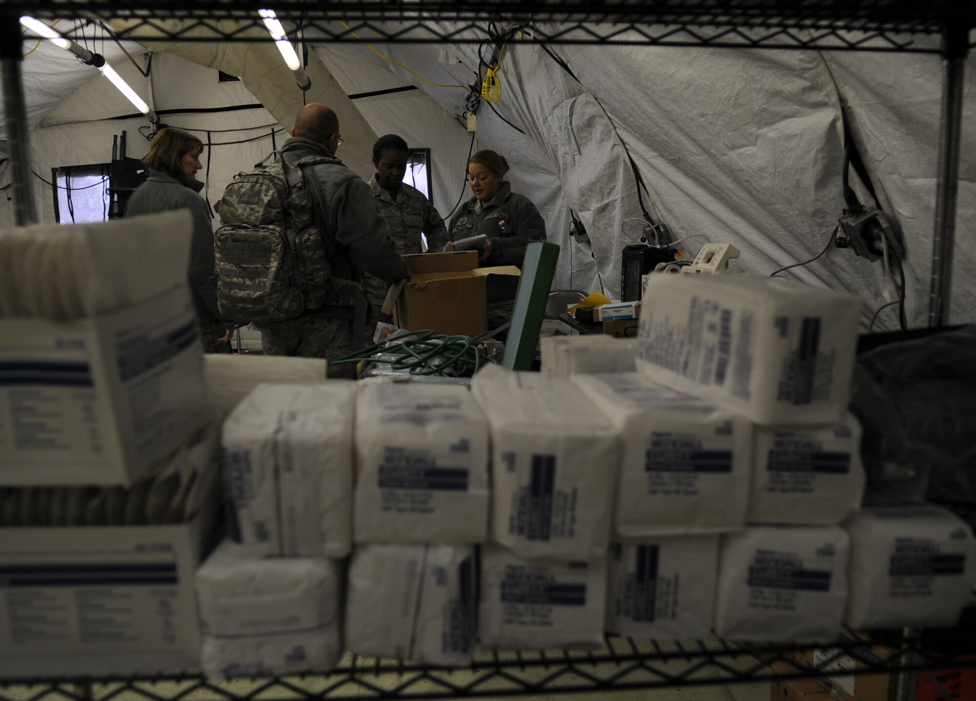 U.S. Air Force Master Sgt. Laurie Walters, School of Aerospace Medicine noncommissioned officer in charge of Expeditionary Medical Support (EMEDS), from Brooks City-Base, Texas, checks the supply checklist for completion after set up of facility population during training, Ramstein Air Base, Germany, March 16, 2010. The EMEDS course teaches and evaluates corps specific field situations as well as offers updates in Air Force Medical Service concept of operations and doctrine. It also teaches setup and packing out of a field EMEDS compound, deployed operations, field medical, nursing and operational support equipment proficiency, field exercises to both emphasize and evaluate learning of concepts taught. (U.S. Air Force photo by Airman 1st Class Caleb Pierce)