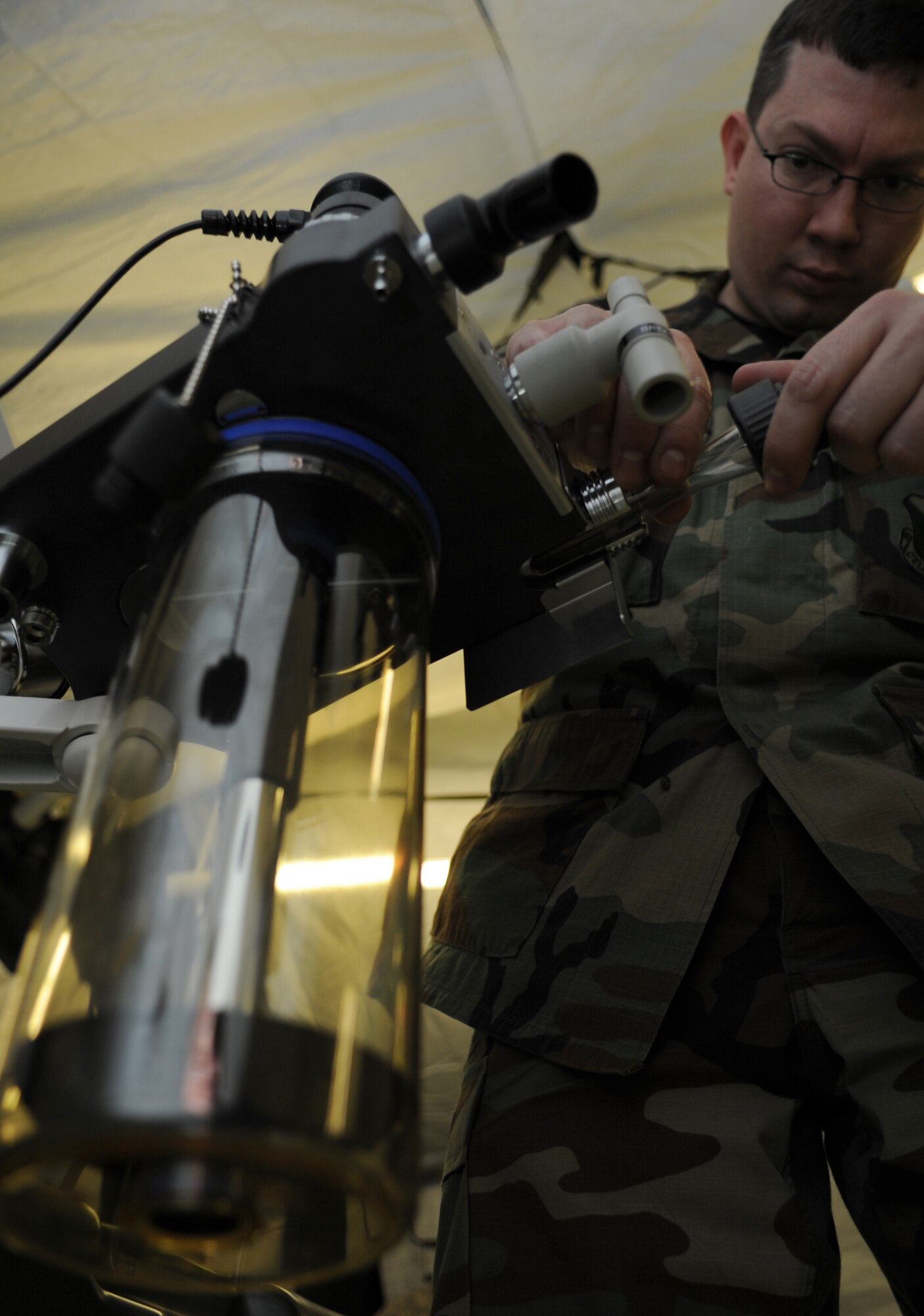 U.S. Air Force Maj. Scott Jensen, 86th Medical Dental Squadron anesthesiologist, assembles operating room medical equipment during the facility population training, Ramstein Air Base, Germany, March 16, 2010. The Expeditionary Medical Support (EMEDS) Mobile Course teaches and evaluates corps specific field situations as well as offers updates in Air Force Medical Service concept of operations and doctrine. It also teaches setup and packing out of a field EMEDS compound, deployed operations, field medical, nursing and operational support equipment proficiency, field exercises to both emphasize and evaluate learning of concepts taught. (U.S. Air Force photo by Airman 1st Class Caleb Pierce)