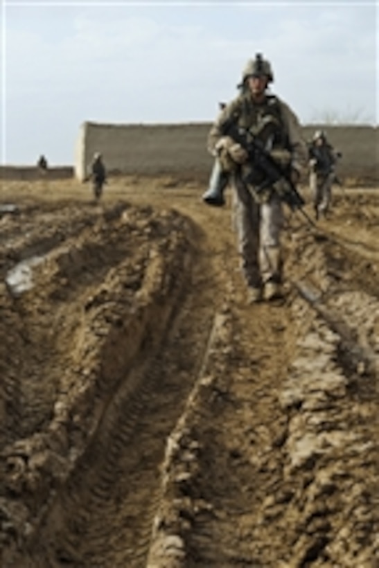 U.S. Marines with 2nd Platoon, Lima Company, 3rd Battalion, 6th Marine Regiment conduct a dismounted patrol in Badula Qulp, Helmand province, Afghanistan, on March 3, 2010.  The Marines are participating in Operation Helmand Spider.  