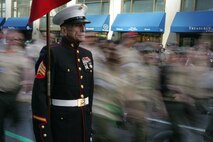 NEW YORK -- Joe Ollerenshaw, a Korean war veteran and member of the Leatherneck Pipes & Drums, stands at attention waiting his unit's turn to step off and march in the 249th  St. Patrick's Day Parade here, March 17. A contingent of more than 300 Marines, including the Quantico Marine Corps Band, ceremonial marchers from Marine Barracks Washington, active and reserve Marines and Marine Corps League members from the New York area, marched in honor of Grand Marshal Raymond W. Kelly, New York City Police Commissioner and retired Marine Corps colonel. (Official Marine Corps photo by Sgt. Randall A. Clinton / RELEASED)