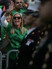 NEW YORK -- Viewers wave and cheer as a formation of Marines passes by during the 249th St. Patrick's Day Parade, here, March 17. A contingent of more than 300 Marines, including the Quantico Marine Corps Band, ceremonial marchers from Marine Barracks Washington, active and reserve Marines and Marine Corps League members from the New York area, marched in honor of Grand Marshal Raymond W. Kelly, New York City Police Commissioner and retired Marine Corps colonel. (Official Marine Corps photo by Sgt. Randall A. Clinton / RELEASED)