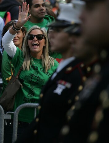 NEW YORK -- Viewers wave and cheer as a formation of Marines passes by during the 249th St. Patrick's Day Parade, here, March 17. A contingent of more than 300 Marines, including the Quantico Marine Corps Band, ceremonial marchers from Marine Barracks Washington, active and reserve Marines and Marine Corps League members from the New York area, marched in honor of Grand Marshal Raymond W. Kelly, New York City Police Commissioner and retired Marine Corps colonel. (Official Marine Corps photo by Sgt. Randall A. Clinton / RELEASED)