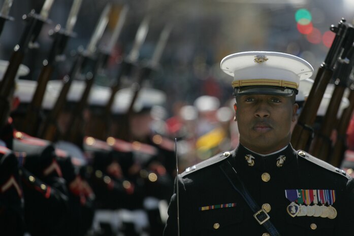 NEW YORK -- Capt. Brian Wilson, platoon commander, 1st platoon, company A, Marine Barracks Washington, leads his platoon during the 249th St. Patrick's Day Parade, here, March 17. A contingent of more than 300 Marines, including the Quantico Marine Corps Band, ceremonial marchers from Marine Barracks Washington, active and reserve Marines and Marine Corps League members from the New York area, marched in honor of Grand Marshal Raymond W. Kelly, New York City Police Commissioner and retired Marine Corps colonel. (Official Marine Corps photo by Sgt. Randall A. Clinton / RELEASED)