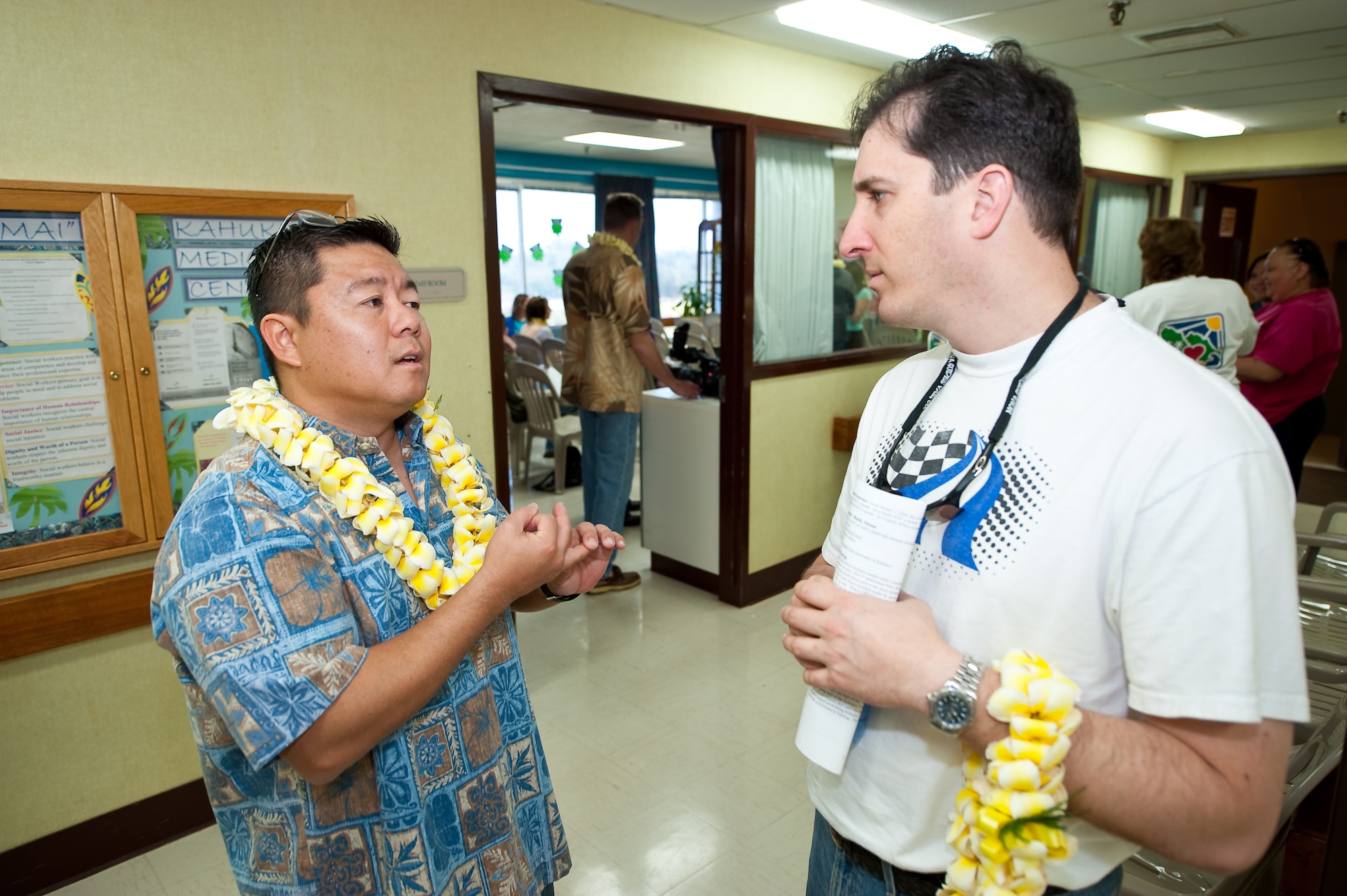 U.S. Air Force Major Joshua Wyte (right), Dentist, 140th Medical Group, Buckley Air Force Base, speaks with U.S. Air Force Capt. Jason Iyomasa, Program Coordinator for the Hawaii Air National Guard about the dental clinic at the Kahuku Medical Center, Kahuku, Hawaii, March 14, 2010. Wyte and his dental team from the Colorado Air National Guard are providing dental services as a part of the Office of the Assistant Secretary of Defense for Reserve Affairs Innovative Readiness Training Program, E Malama Kakou (translated from Hawaiian as “to care for all”). (U.S. Air Force photo/Master Sgt. John Nimmo, Sr.) (RELEASED)