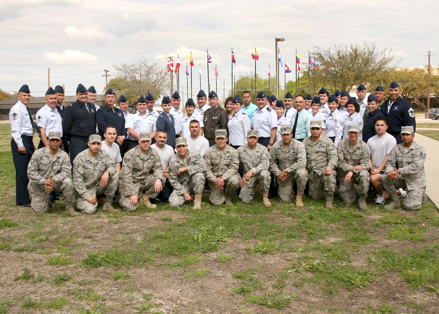 The staff of the Inter-American Air Forces Academy gathers to celebrate the academy's 67th Anniversary March 15. As the Air Force's gateway to the Americas, IAAFA has been training students from Central and South America countries since March 15, 1943. (U.S. Air Force photo/Robbin Cresswell)