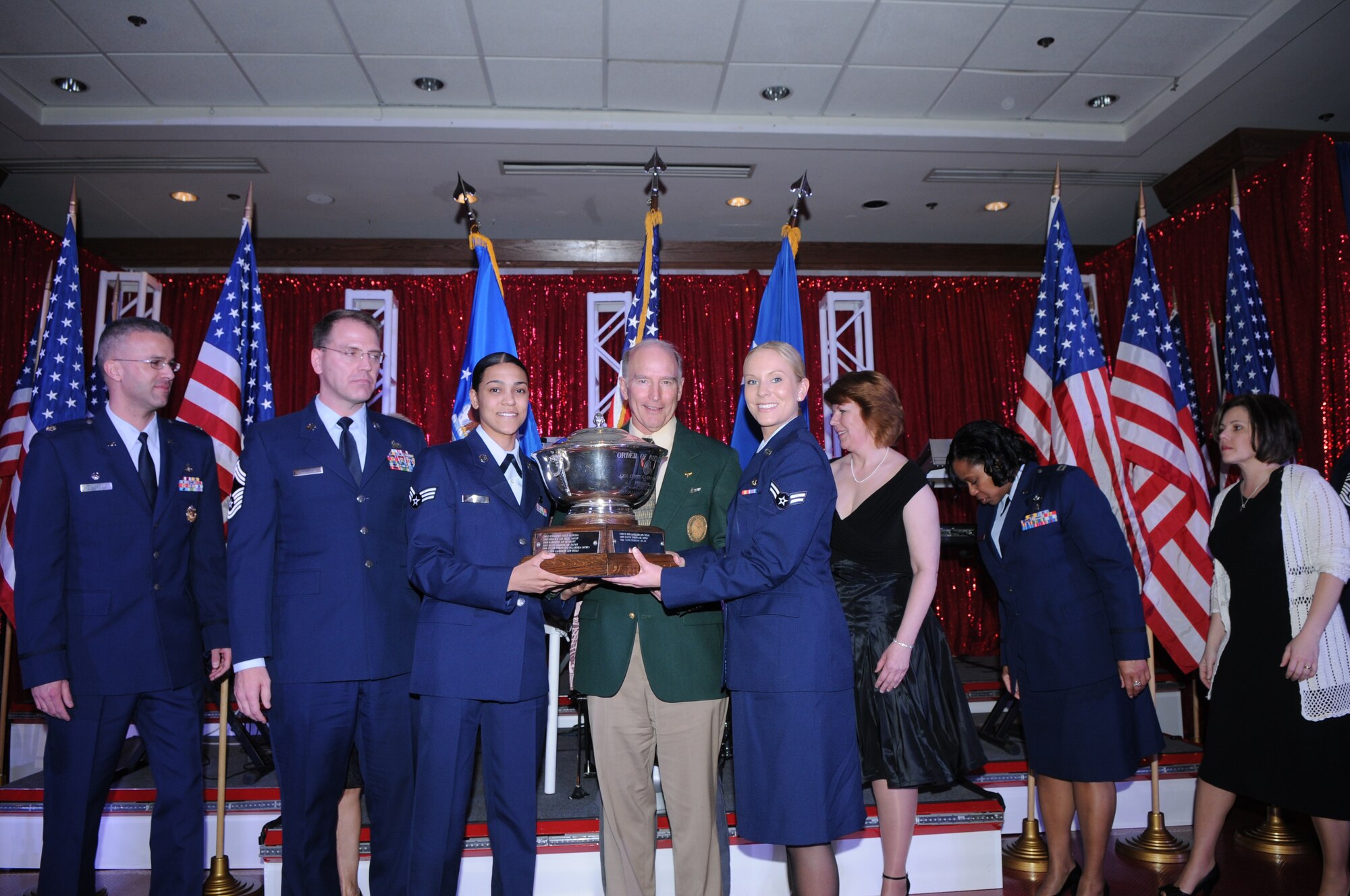 The Gen. Curtis E. LeMay Award was presented to the 21st Force Support Squadron March 11, at the 2010 World Wide Force Support Conference Annual Awards Banquet in San Antonio, Texas. Accepting the award on behalf of 21st FSS are, (from left) Lt. Col. John Silverman, Chief Master Sgt. David McAfee, Senior Airman Talisa Williams, retired Lt. Col. Brett Dula, Airman 1st Class Casey Mann, and Cathy Lovelady. Mr. Dula represents the Order of Daedalians, sponsor of the LeMay award. The 21st FSS was named the best large support squadron in the Air Force. The award evaluates mission accomplishment and innovation, management and customer service. The evaluation team looked at leadership, flight function and customer satisfaction. (Courtesy photo)