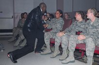 Tech. Sgt. Octavious Hill sings to Air Force Basic Military Training trainee Paola Rivera-Milborn, 326th Training Squadron, during the Tops In Blue concert March 13 at the Bob Hope Performing Arts Center. Sergeant Hill is with the 99th Civil Engineer Squadron, Nellis AFB, Nev. (U.S. Air Force photo/Alan Boedeker)