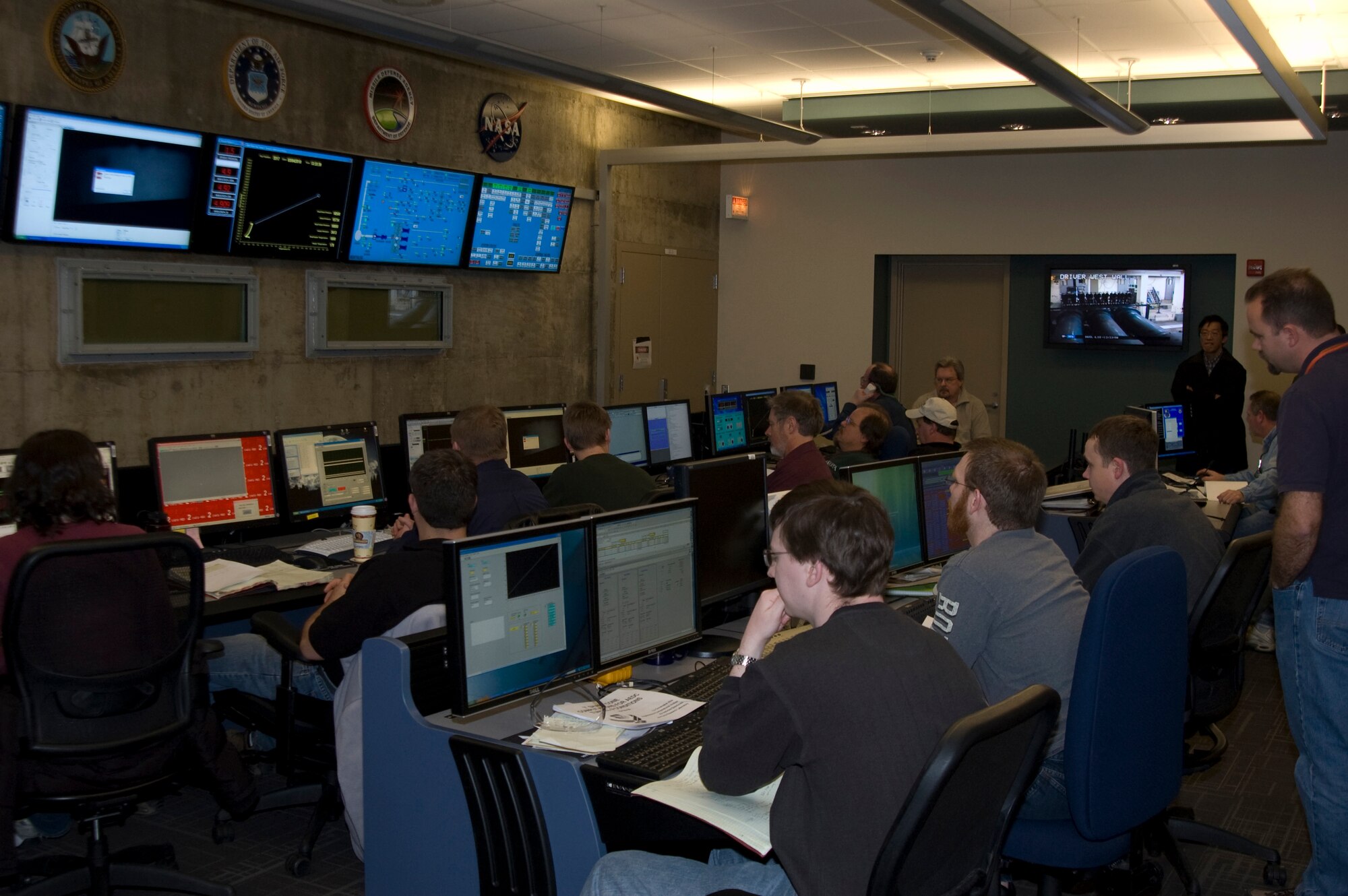 Tunnel 9 staff, students and researchers from several organizations gather to collaborate on ground-breaking science and technology in the recently returned-to-service testing operational control room. (Photo by John Lafferty)