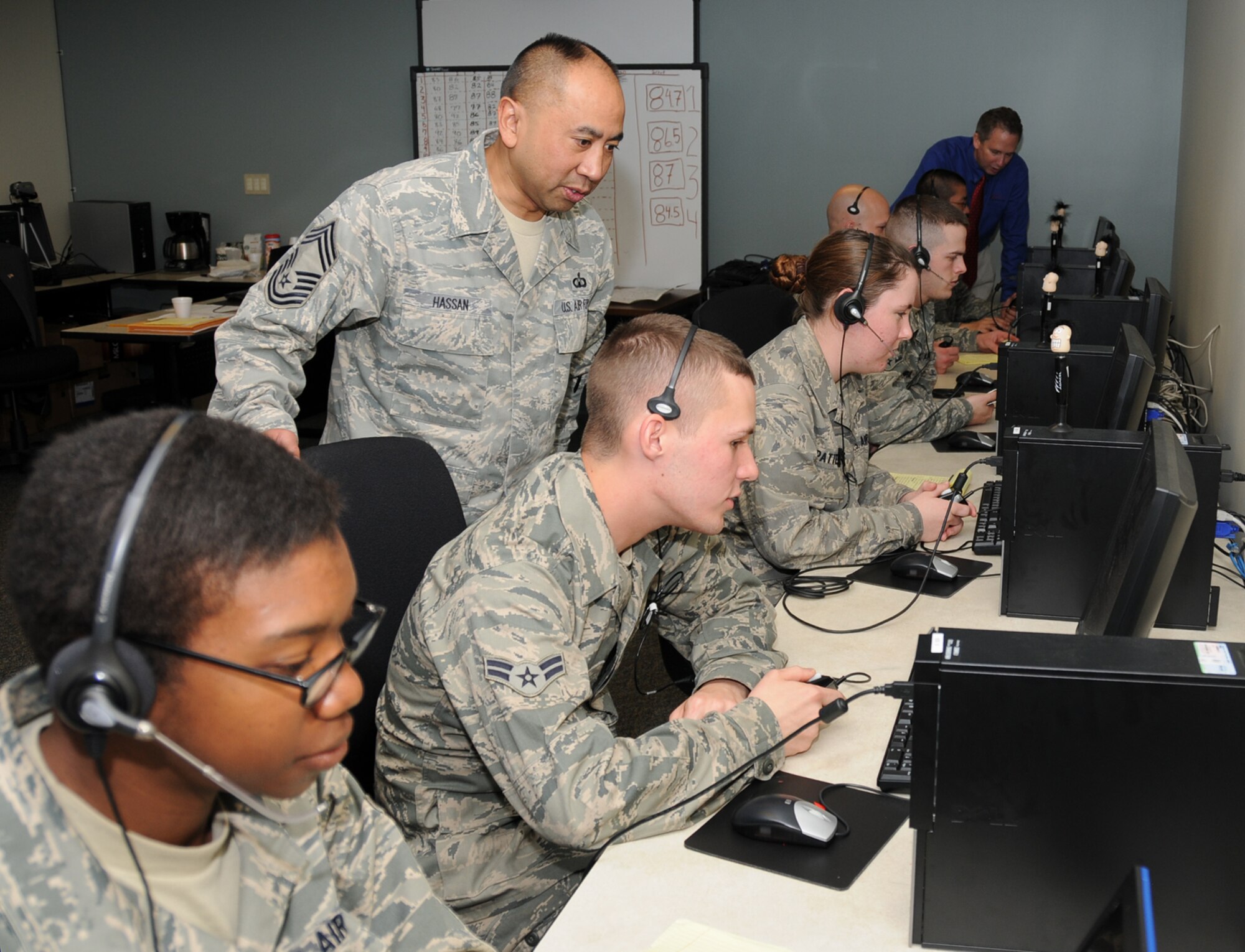 Chief Hassan talks with Airman 1st Class Kevin Phillips, one of the AFIs participating in the ICE demonstration March 11 at Cody Hall.  (U.S. Air Force photo by Kemberly Groue)