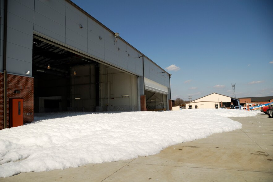 The 188th Fighter Wing conducts a validation test of the high-expansion foam system in the unit's new consolidated maintenance facility in Fort Smith, Ark. This was the only test of the foam system, which functions as fire suppression. The 188th's consolidated maintenance facility was recently LEED Silver certified. It was the first maintenance facility in the ANG to achieve such a rating. (U.S. Air Force photo by Tech Sgt. Stephen Hornsey/188th Fighter Wing Public Affairs)
