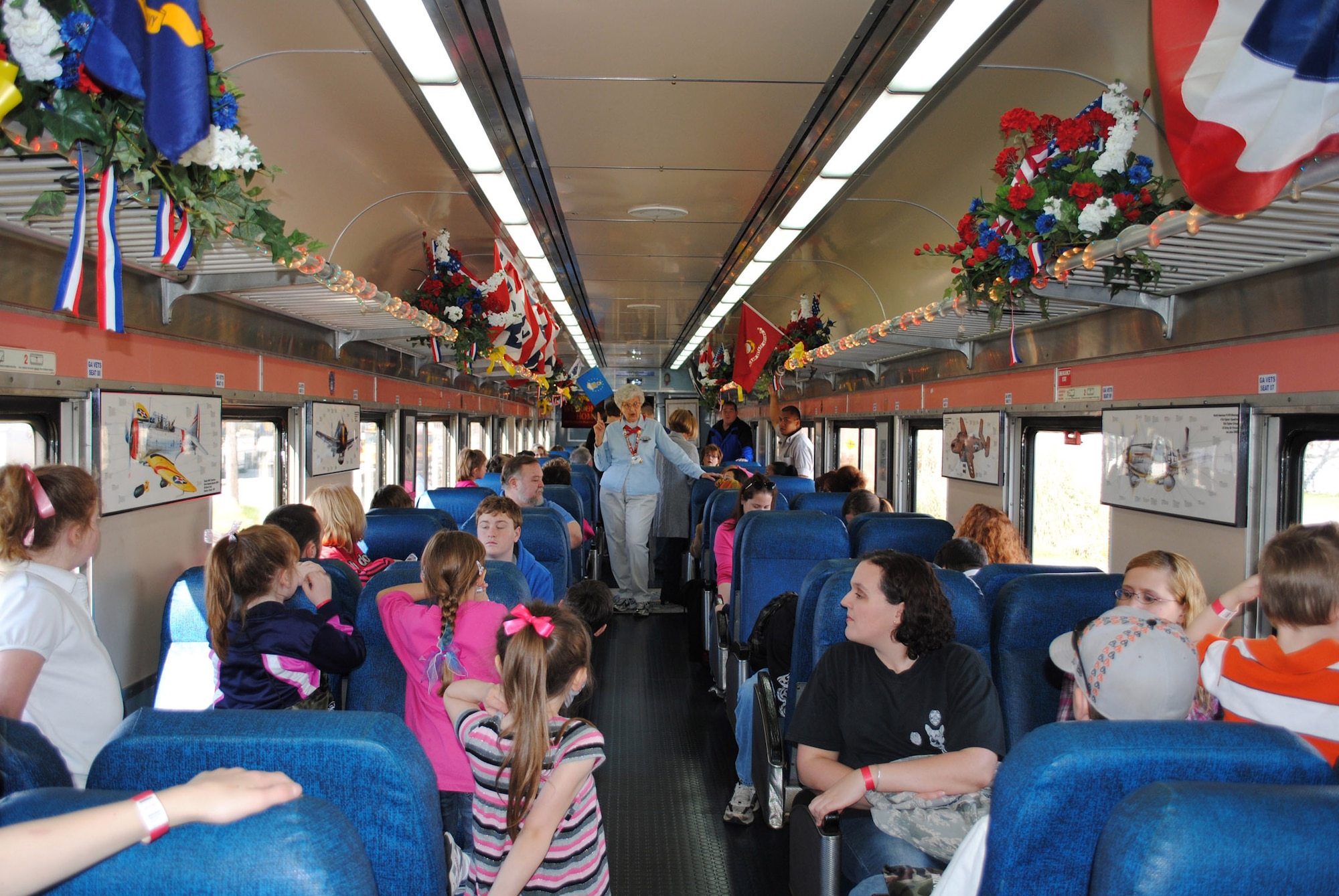 The Airman and Family Readiness Center sponsored a deployed spouses train trip Saturday to Plains. The families were surprised by a visit with President Jimmy Carter.