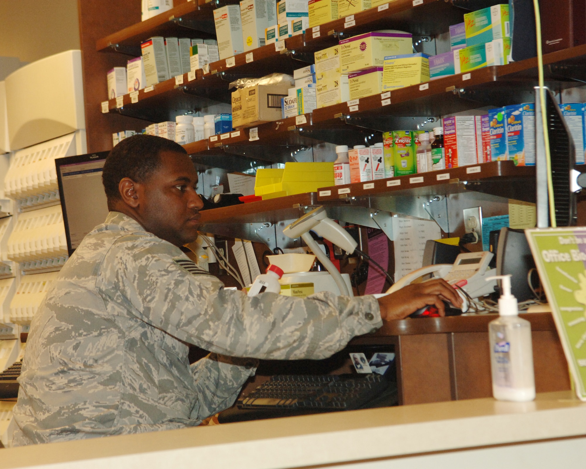 BUCKLEY AIR FORCE BASE, Colo. -- Tech. Sgt. Major Strickland inputs supply data into a computer March 17 at the Buckley Air Force Base pharmacy. (U.S. Air Force photo by Tech. Sgt. Shirley Henderson)
