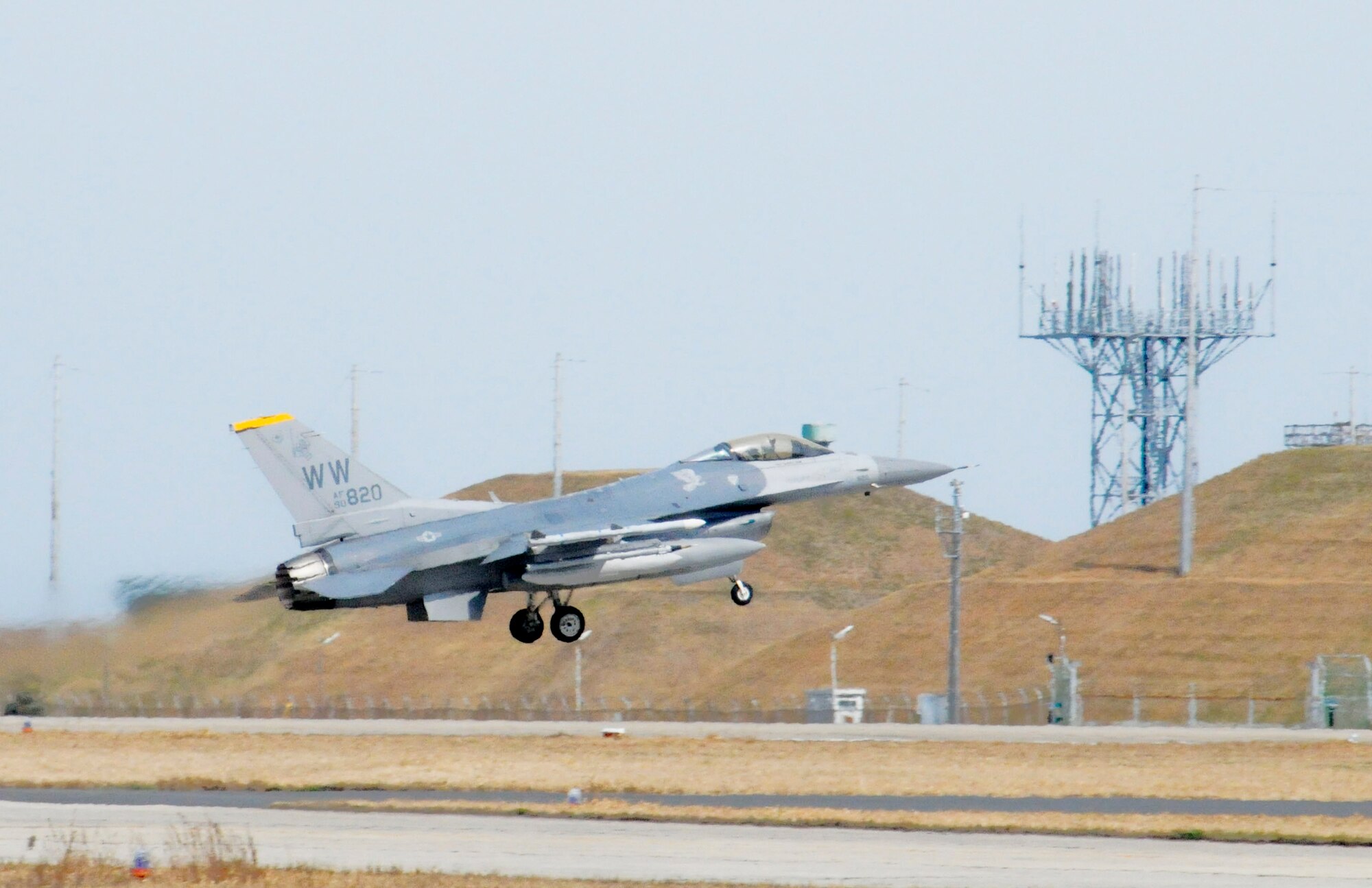 The last F-16 Fighting Falcon from the 14th Fighter Squadron takes off signaling an end to the aviation training relocation exercise March 12, 2010, at Tsuiki Air Base, Japan. (U.S. Air Force photo/Staff Sgt. Rachel Martinez)
