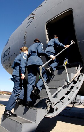 Royal Canadian Air Force Cadets board a static C-17 during a tour at Joint Base Charleston, S.C., March 16, 2010. The cadets drove 22 hours from London, Ontario, Canada, to learn about American military operations. During their tour of Joint Base Charleston, the cadets visited numerous base facilities and watched a demonstration of the military working dogs. (U.S. Air Force Photo/Airman 1st Class Lauren Main)