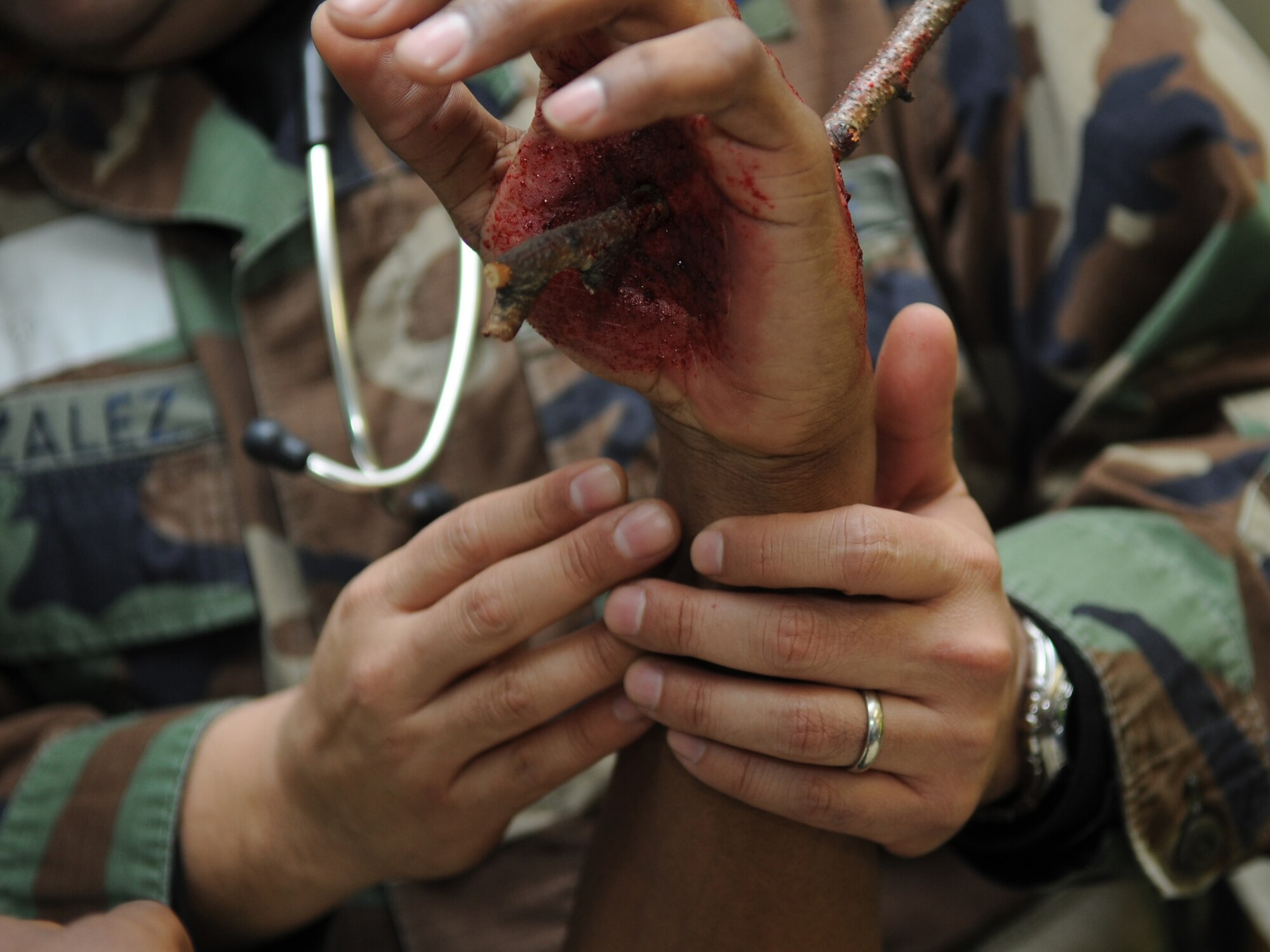 U.S. Air Force medical members participate in a mass casualty exercise during the Expeditionary Medical Support (EMEDS) Mobile Course training, Ramstein Air Base, Germany, March 17, 2010. The EMEDS course teaches and evaluates corps specific field situations as well as offers updates in Air Force Medical Service concept of operations and doctrine. It also teaches setup and packing out of a field EMEDS compound, deployed operations, field medical, nursing and operational support equipment proficiency, field exercises to both emphasize and evaluate learning of concepts taught. (U.S. Air Force photo by Airman 1st Class Caleb Pierce)