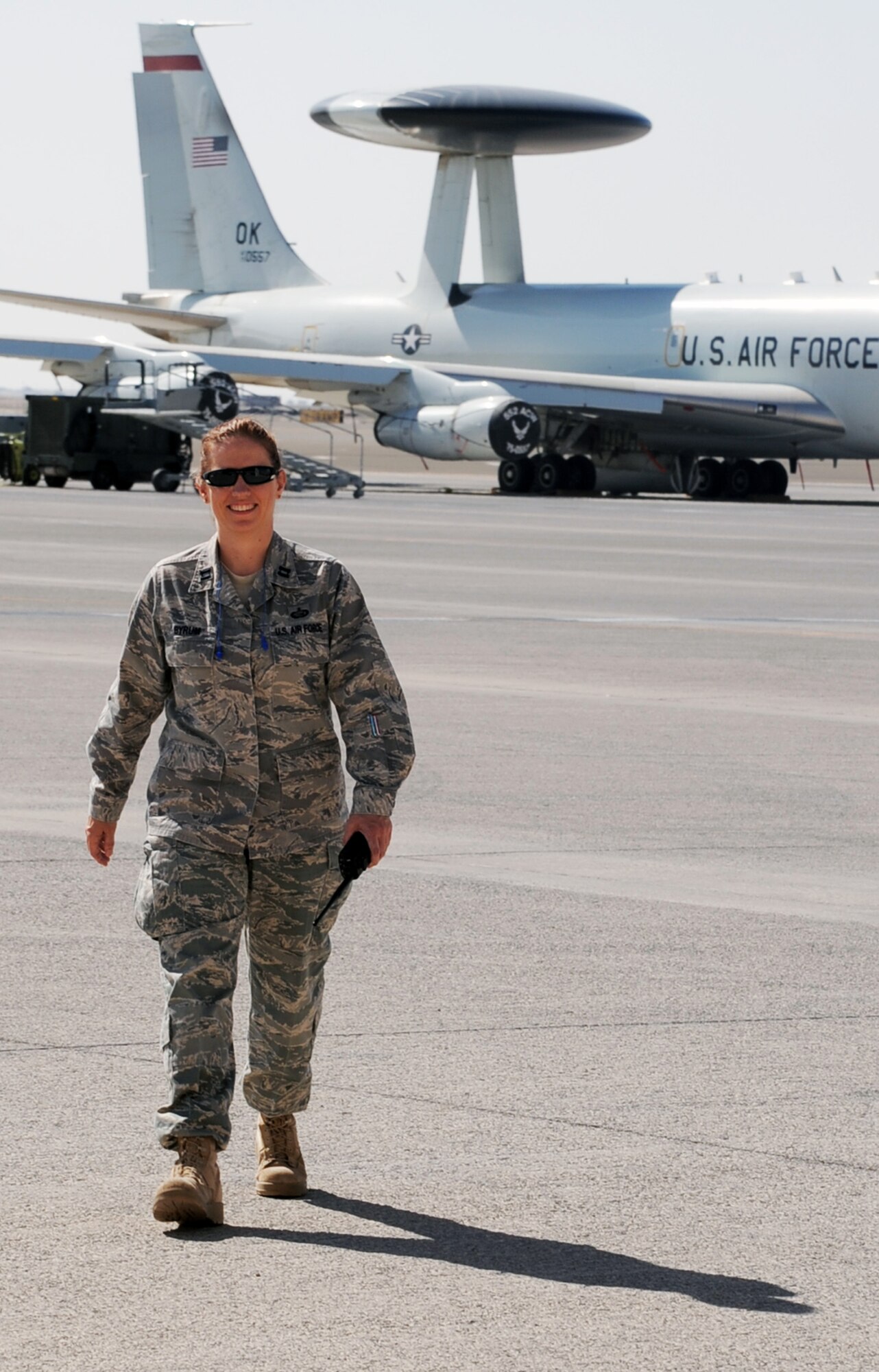 Capt. Sandra Byrum, 380th Air Expeditionary Wing protocol officer, talks over the radio works during a visit to the 380th AEW by a distinguished visitor at a non-disclosed base in Southwest Asia on Feb. 10, 2010. Captain Byrum is deployed from Joint Base McGuire-Dix-Lakehurst, N.J., and her hometown is Rainsville, Ala.  (U.S. Air Force Photo/Master Sgt. Scott T. Sturkol/Released)