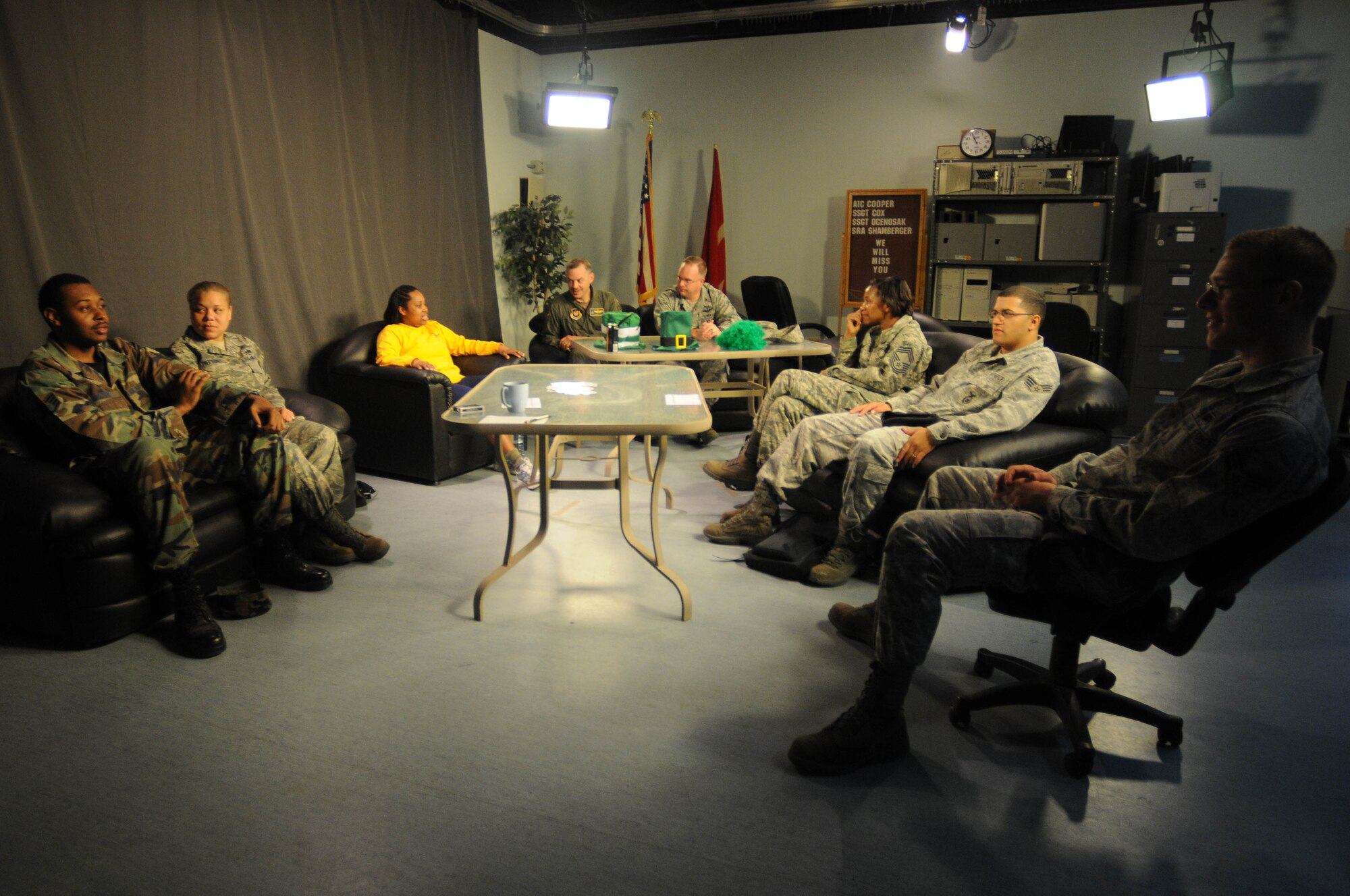 Incirlik members wait in the simulated jail room at the American Forces Network office until their time is up Wednesday, March 17, 2010 at Incirlik Air Base, Turkey.  Incirlik members could pay $30 for a co-worker to spend time in “jail” for 30 minutes.  Every dollar over 30 added an extra minute on their jail time.  All proceeds went to the Air Force Assistance Fund, a fundraising campaign that distributes aid money to four charities.  (U.S. Air Force photo/Senior Airman Ashley Wood)