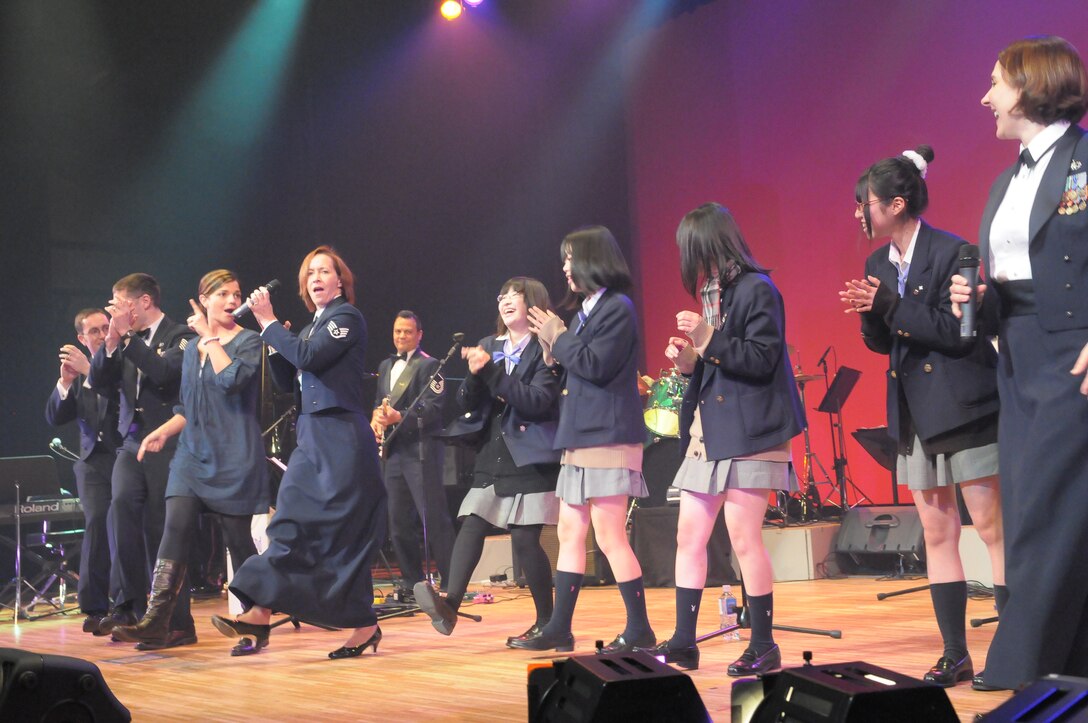 Pacific Trends went on a 10 day road trip to Iwate and Miyagi Prefecture in Japan to perform a “Mega Band” show with members from the USAF Band of the Pacific, Alaska.  The show consisted of rock band with horns for the first half, playing hits from the 60s, 70s, 80s, to include songs from “The Carpenters,” “The Beatles”, and R&B classics, as well as Japanese popular songs.  The inspired crowd danced to the “Twist” and “JB Goode”; all dancers received a copy of Pacific Trends’ latest CD.  These friendship concerts were full of variety, and made a lasting impression on the Japanese public