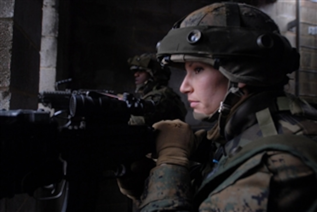 U.S. Marine Corps lieutenants with Golf Company keep an eye out for aggressors during a training exercise at the Military Operations in Urban Terrain Training Center at The Basic School at Camp Barrett, Marine Corps Base Quantico, Va., on March 3, 2010.  