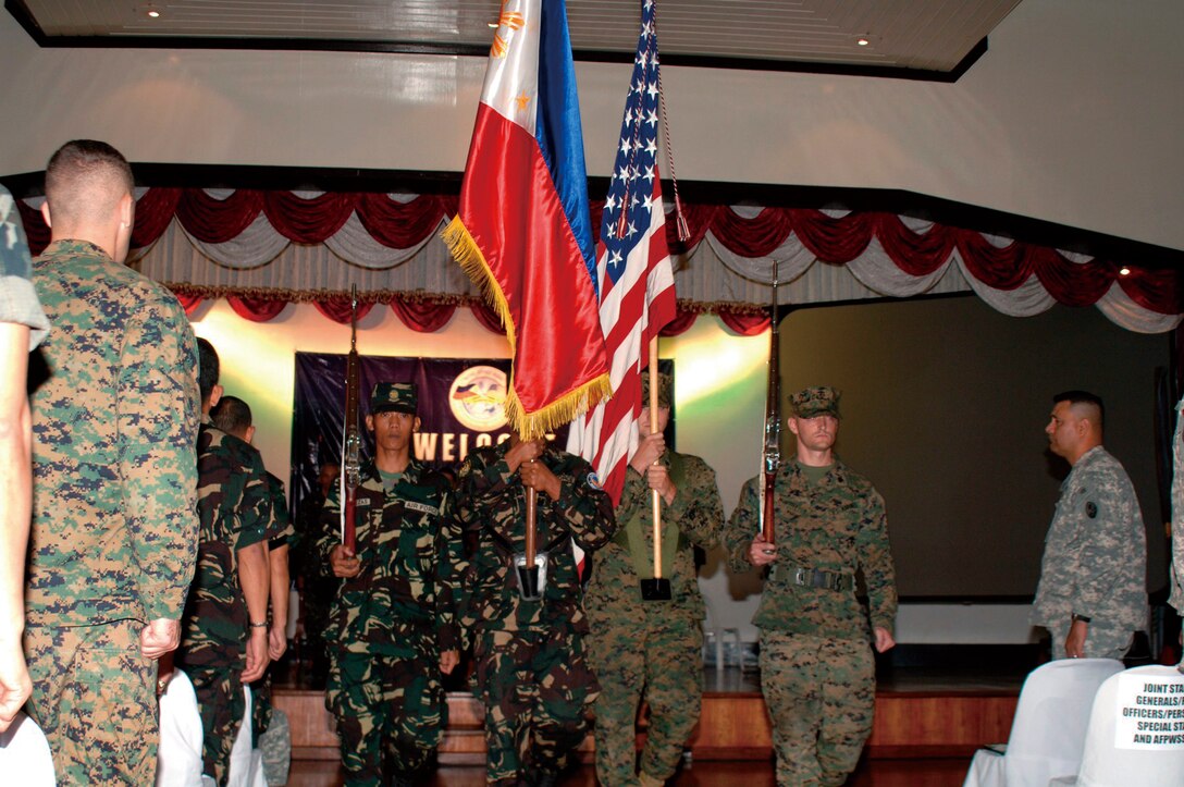 An Armed Forces of the Philippines and U.S. military color guard retires the colors for Balikatan 2010 during the exercise's closing ceremony March 19 at the AFP Commissioned Officers' Club on Camp Aguinaldo.