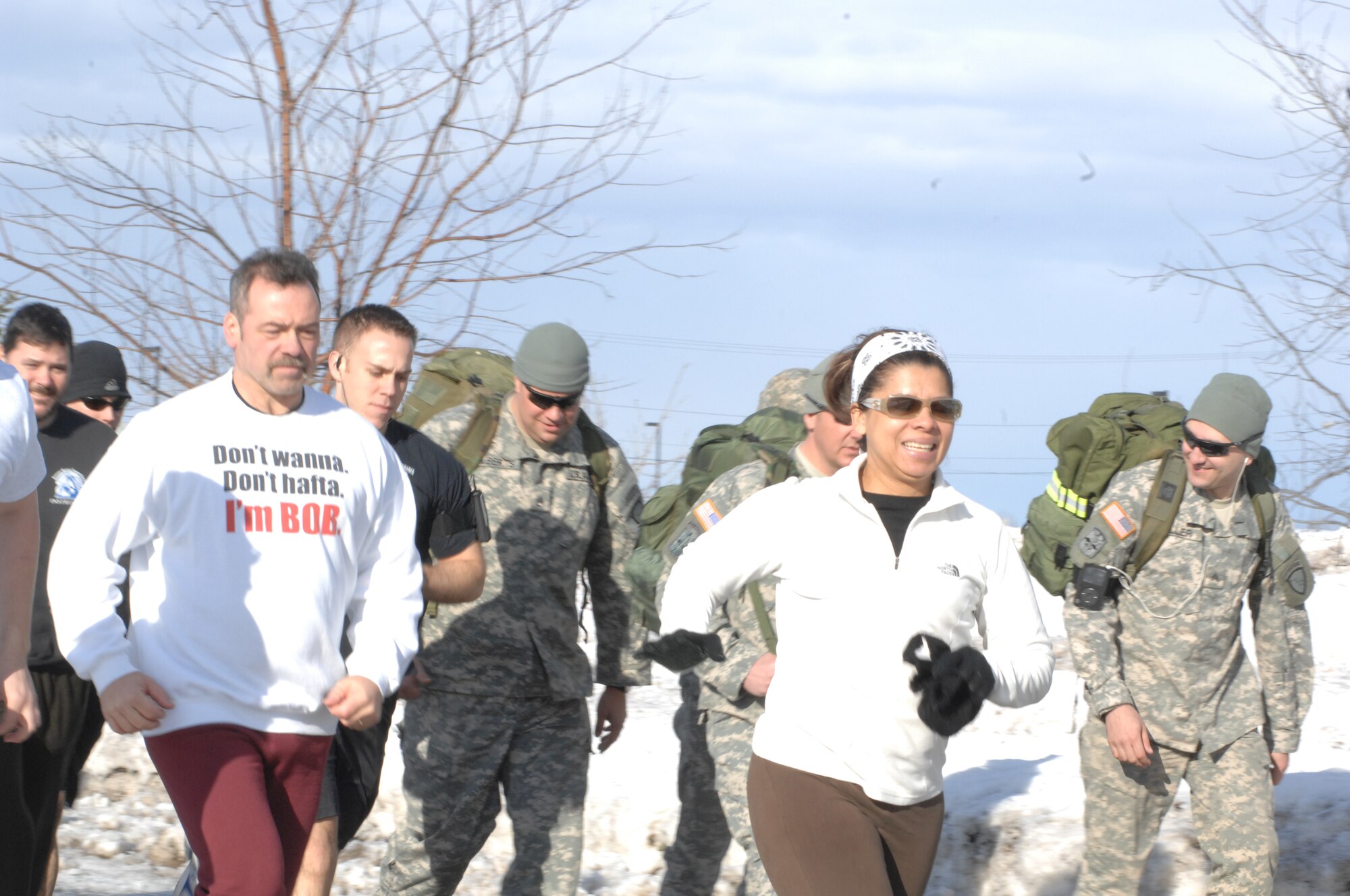 ELMENDORF AIR FORCE BASE, Alaska – People run off the starting line as they begin the EOD five kilometer Fun Run March 19. All proceeds from the fun run went to support EOD operations. (U.S. Air Force photo/ Airman 1st Class Jack Sanders)