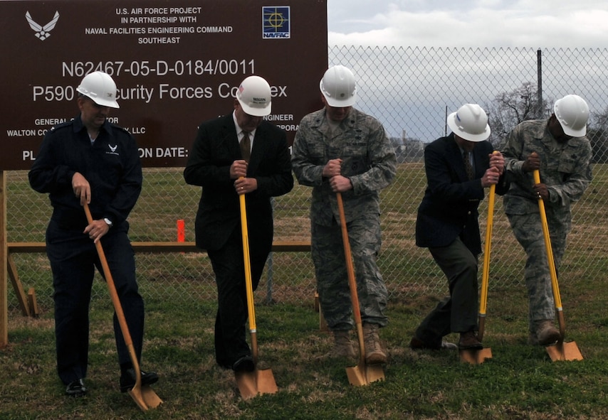 BARKSDALE AIR FORCE BASE, La. – Barksdale leadership and members of Walton Construction break ground for the new 2d Security Forces Squadron Mar. 8. The projected completion date for the complex is February 2011. (U.S. Air Force photo by Senior Airman La’Shanette V. Garrett) (RELEASED)