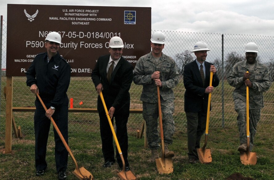 BARKSDALE AIR FORCE BASE, La. – Barksdale leadership and members of Walton Construction break ground for the new 2d Security Forces Squadron Mar. 8. The projected completion date for the complex is February 2011. (U.S. Air Force photo by Senior Airman La’Shanette V. Garrett) (RELEASED)
