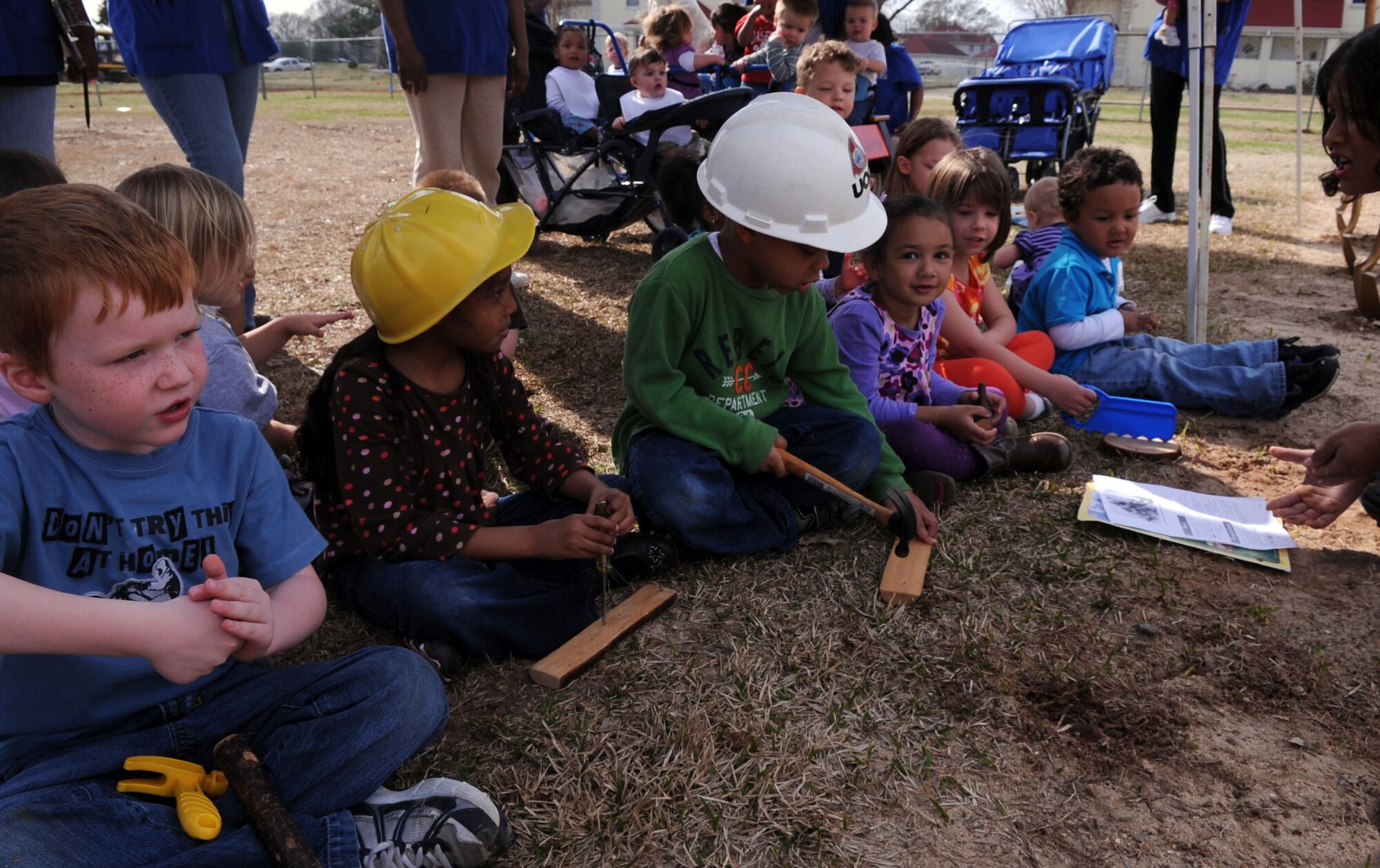 BARKSDALE AIR FORCE BASE, La. – Children from rooms 17 and 18 of the Child Development Center entertain the crowd with a song before the ground - breaking ceremony at the CDC, Mar. 10. The new $5 million CDC will increase the capacity of approximately 94 children. (U.S. Air Force photo by Senior Airman La’Shanette V. Garrett) (RELEASED)