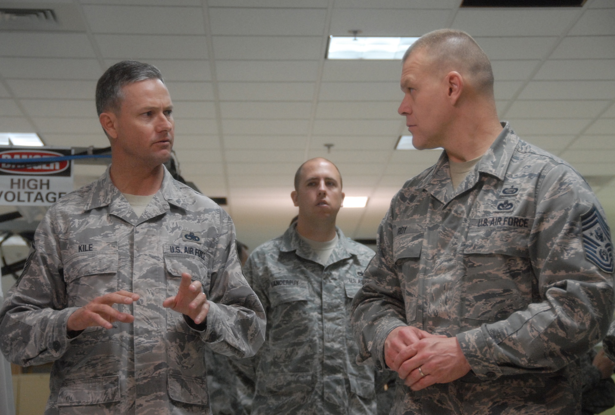 Senior Master Sgt. Kevin Kile, 16th Electronic Warfare Squadron, speaks to Chief Master Sgt. of the Air Force James Roy about the electronic warfare test mission March 18 at Eglin Air Force Base, Fla.  The CMSAF’s two-day visit to the base included tours of units within the various wings and speaking with junior enlisted and senior leadership on Air Force issues.  (U.S. Air Force photo/Samuel King Jr.)