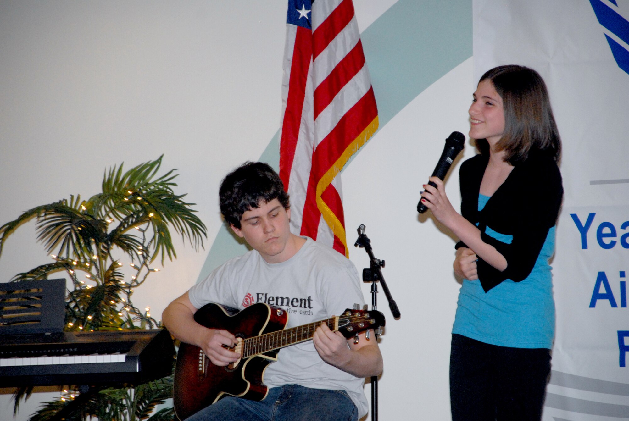 Brian and Rebecca Sheetz perform 'My Happy Ending' by Avril Lavigne during the You Got Talent Program at the Youth Center March 18. They won first place in the Teen's group performance division of the event. (U.S. Air Force photos/ Airman 1st Class Matthew Hubby)
