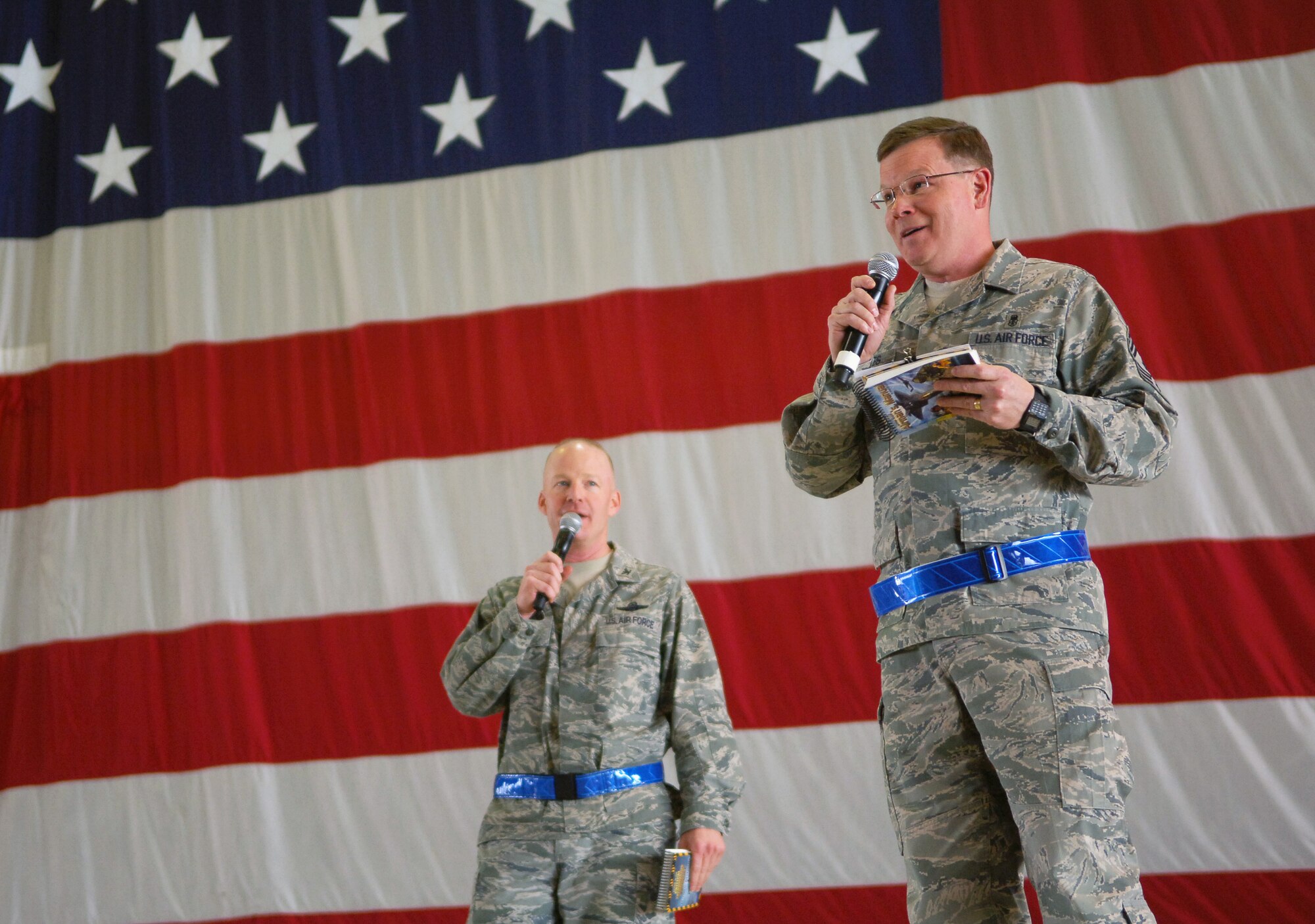 SCOTT AIR FORCE BASE, Ill. – Chief Master Sgt. James Suttles, 375th Air Mobility Wing command chief, speaks to hundreds of Airmen encouraging them to be “outstanding” during the upcoming Operational Readiness Inspection while Col. Gary Goldstone, 375th AMW commander, looks on, March 19, 2010. (U.S. Air Force photo/ Senior Airman Ryan Crane)