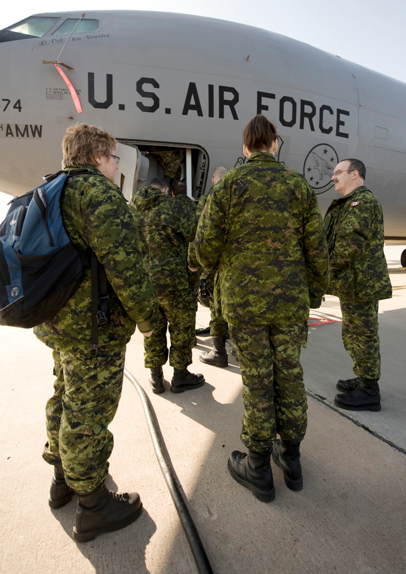 Members of the Canadian air force's 425th Tactical Fighter Squadron board a KC-135 Stratotanker for an orientation flight March 17, 2010, at Altus Air Force Base, Okla. (U.S. Air Force photo/Master Sgt. Jack Braden)