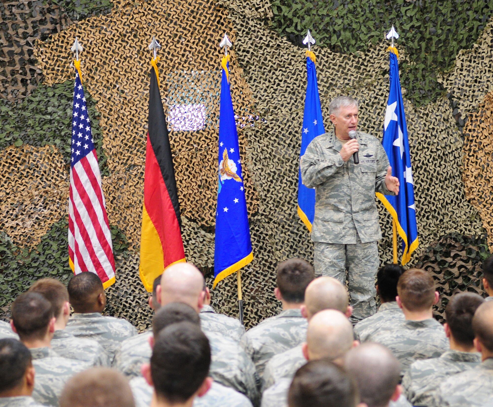 RAMSTEIN AIR BASE, Germany -- Gen. Roger A. Brady, commander U. S. Air Forces in Europe, speaks to members of the 435th Air Ground Operations Wing during a commander’s call March 16, 2010. General Brady and Chief Master Sgt. Pamela Derrow, USAFE command chief master sergeant, spent the day visiting the facilities of the 435th Air Ground Operations Wing. It was their first visit to USAFE's newest wing since it stood up in July 2009. (U.S. Air Force photo by Airman Desiree Esposito)