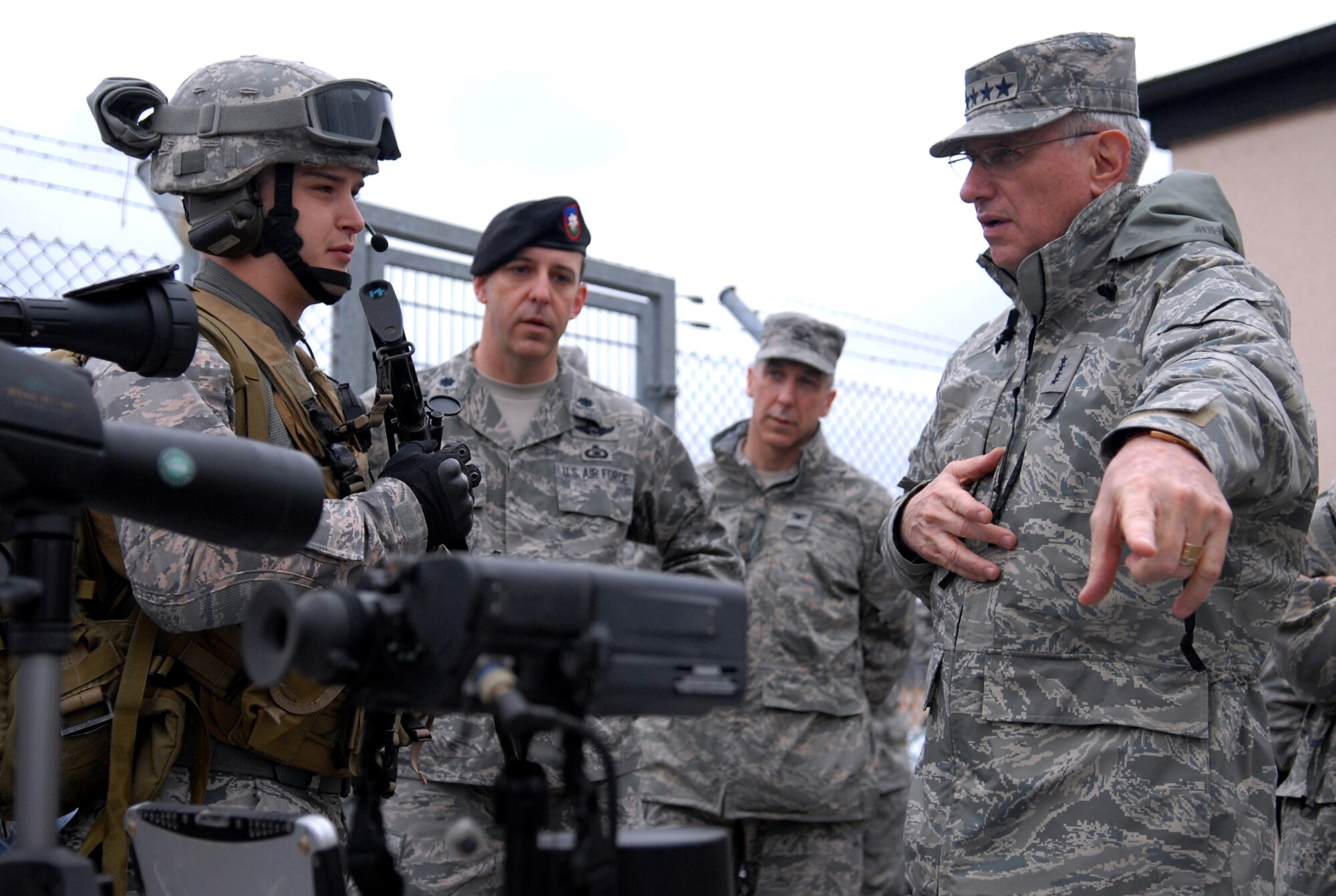 RAMSTEIN AIR BASE, Germany – Gen. Roger A. Brady, commander U.S. Air Forces in Europe, talks with Airman 1st Class Michael Kelley, a tactical air control party specialist, about the equipment he carries in the field during a visit to the 4th Air Support Operations Group at Wiesbaden Army Air Field, March 16, 2010. General Brady and Chief Master Sgt. Pamela Derrow, USAFE command chief master sergeant,  spent the day visiting the facilities of the 435th Air Ground Operations Wing. It was their first visit to USAFE's newest wing since it stood up in July 2009. (U.S. Air Force photo by Capt. John Ross)