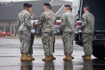 A U.S. Army carry team transfers the remains of Army Sgt. Jonathan J. Richardson, of Bald Knob, Ark., at Dover Air Force Base, Del., March 12. Richardson was assigned to the 1st Battalion,187th Infantry Regiment, 3rd Brigade Combat Team, 101st Airborne Division (Air Assault) at Fort Campbell, Ky. (U.S. Air Force photo/Roland Balik)
