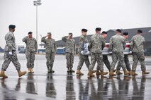 A U.S. Army carry team transfers the remains of Army Pfc. Jason M. Kropat, of White Lake, N.Y., at Dover Air Force Base, Del., March 12. Pfc. Kropat was assigned to the 1st Battalion,187th Infantry Regiment, 3rd Brigade Combat Team, 101st Airborne Division (Air Assault) at Fort Campbell, Ky. (U.S. Air Force photo/Roland Balik)